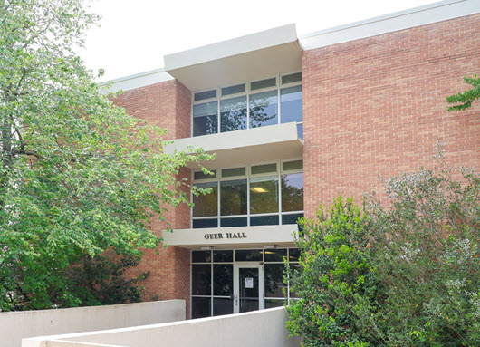 Exterior view of traditional brick residence hall.