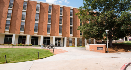 Exterior view of traditional brick residence hall.