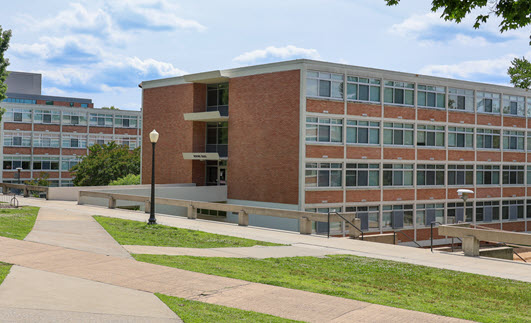 Exterior view of traditional brick residence hall.