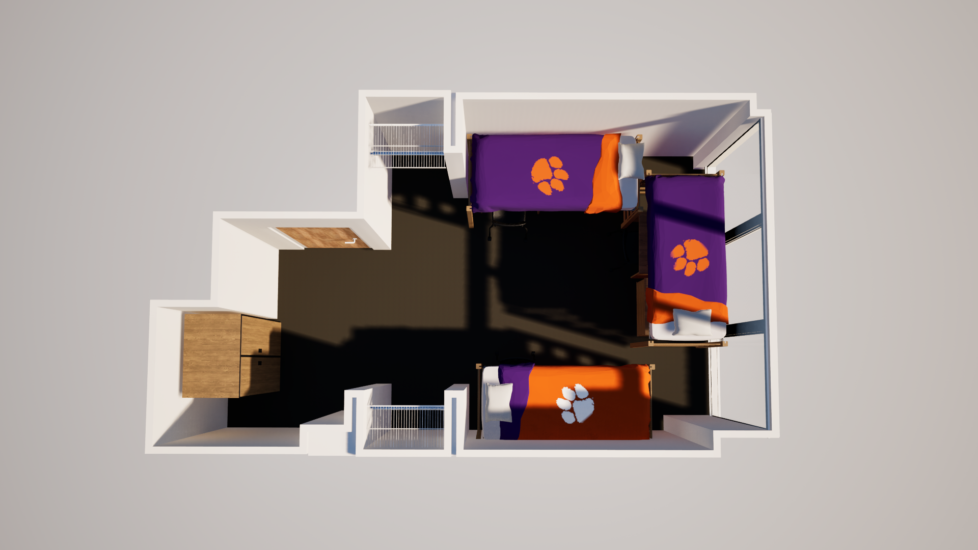 3D floor plan of a triple room with three beds, dressers, closets, shared entry space, and a bathroom area near the door.